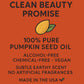 Product label for Nubian Nutrified DHT pumpkin seed oil with a clean beauty promise on an orange background.