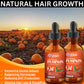 Two bottles of Nubian Nutrified DHT Pumpkin Seed Oil with a pumpkin field and sunset in the background.